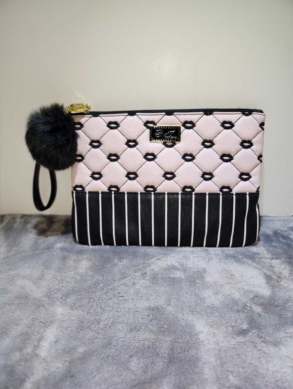 Betsey Johnson pink and black quilted lip clutch
